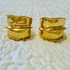 Pair of gold sculptural cuff bracelets from Zara